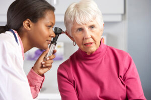 bigstock Doctor Examining Senior Female 41853370