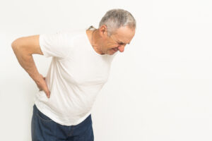 Home care assistance help seniors with back pain with needed support and care.